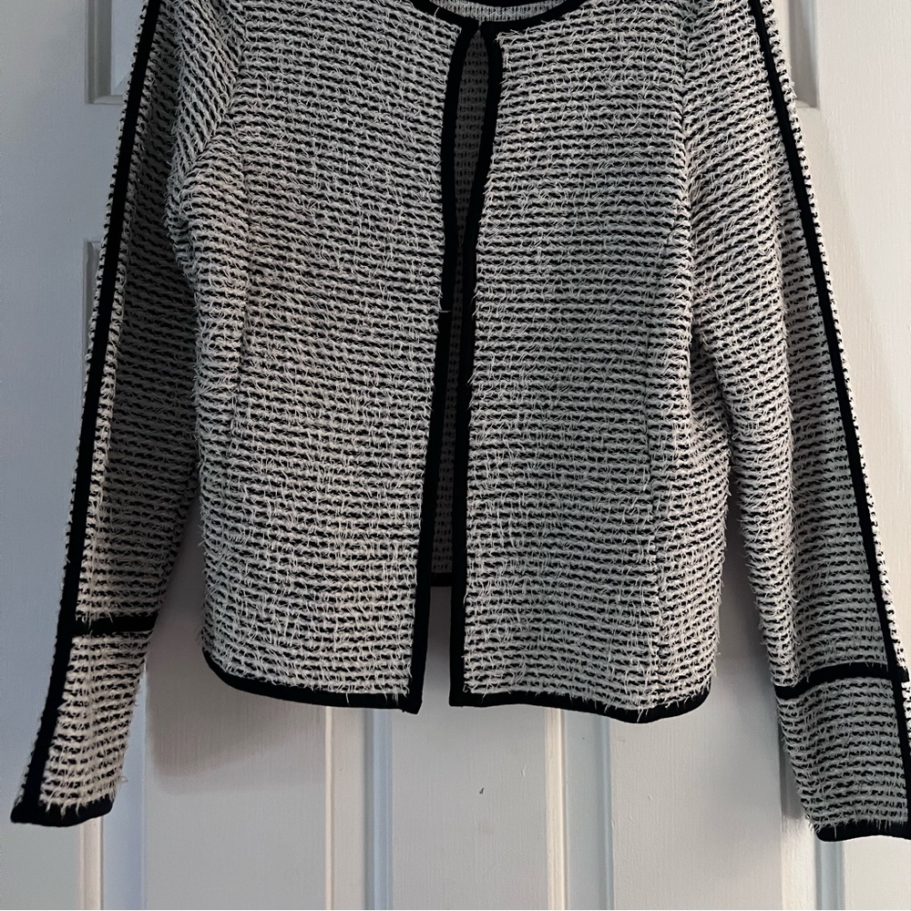 Very soft Bianca European designer brand cardigan.  Stylishy versatile!